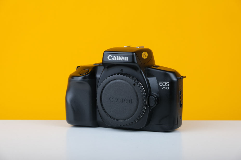 Canon EOS 750 camera orders and lens