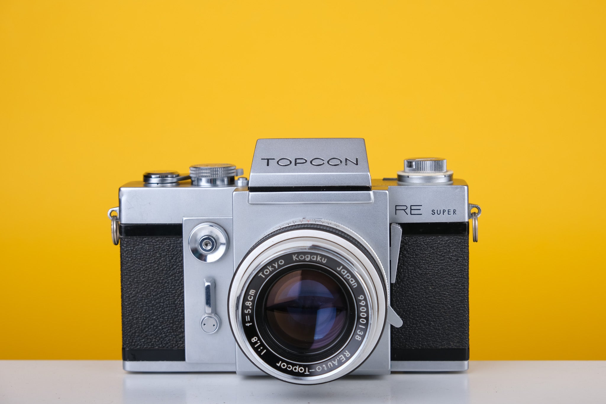 Topcon RE Super with 35mm SLR Film Camera with Kogaku 58mm f1.8 lens –  Vintage Camera Hut