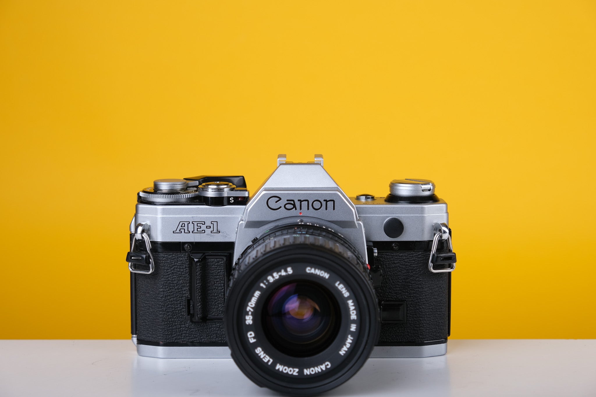 Canon AE-1 Silver 35mm SLR Film Camera with Canon Zoom FD 35-70mm