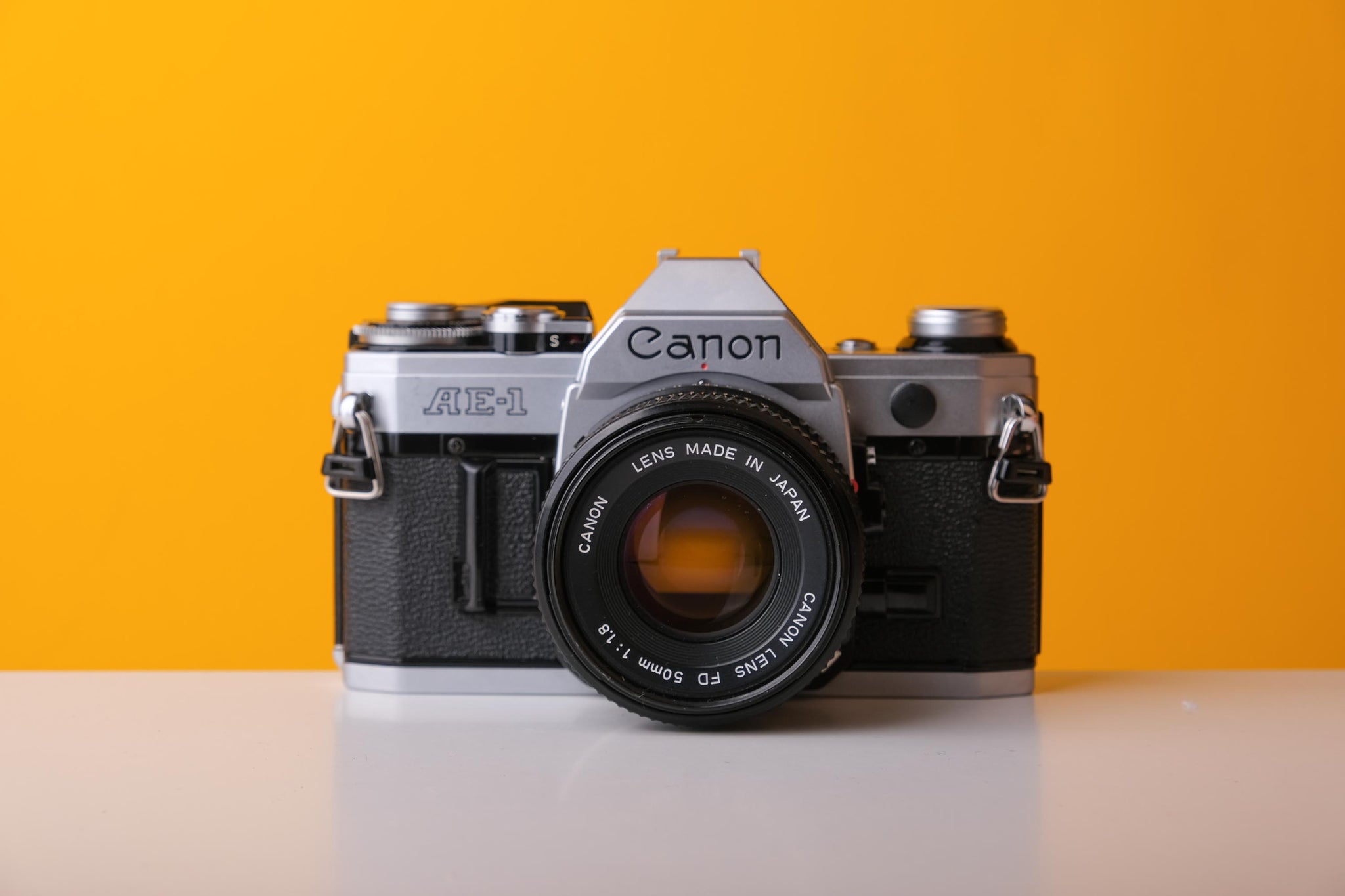 Canon AE-1 35mm SLR Film Camera with Canon 50mm f/1.8 FD Lens - WORKING  PERFECT!