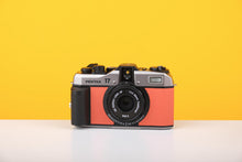 Load image into Gallery viewer, Pentax 17 35mm Half Frame Film Camera Orange Skin + FREE Expired Film Roll + 1 VCH T-shirt
