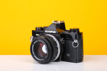 Load image into Gallery viewer, Olympus OM-2n MD Black 35mm Film Camera with Zuiko 50mm f/1.8 Lens
