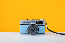 Load image into Gallery viewer, Olympus Trip 35 Vintage Film Camera with Zuiko 40mm f2.8 Lens With New Baby Blue Leather Skin
