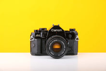 Load image into Gallery viewer, Canon A-1 35mm SLR Film Camera with Canon FD 50mm f1.8 Lens
