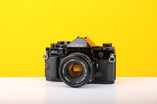 Load image into Gallery viewer, Canon A-1 35mm SLR Film Camera with Canon FD 50mm f1.8 Lens
