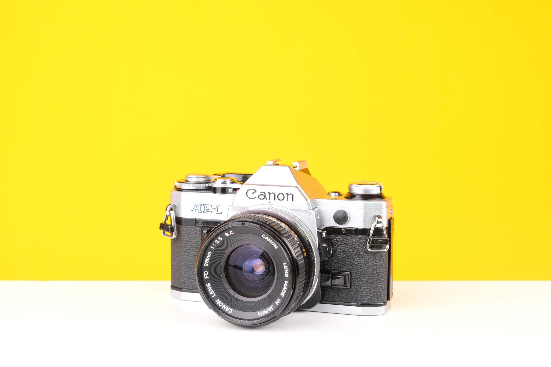 Canon AE-1 35mm SLR Film Camera with Canon S.C. 28mm f3.5 Lens