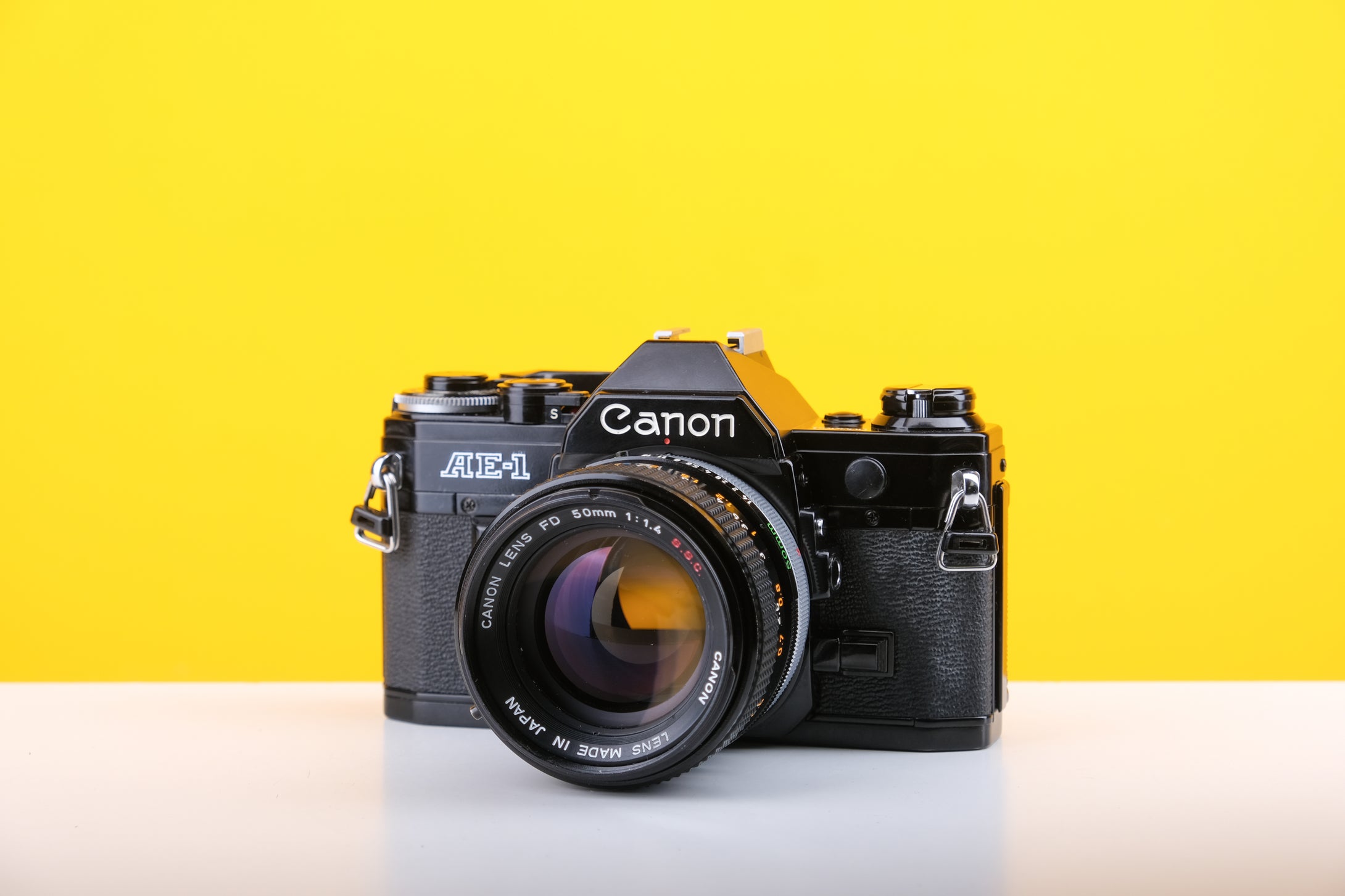 Canon AE-1 Black 35mm Film Camera with Canon FD 50mm f1.4 S.S.C. Prime Lens