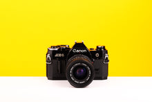 Load image into Gallery viewer, Canon AE-1 35mm SLR Film Camera with Canon Zoom FD 35-70mm f3.5-4.5 Lens
