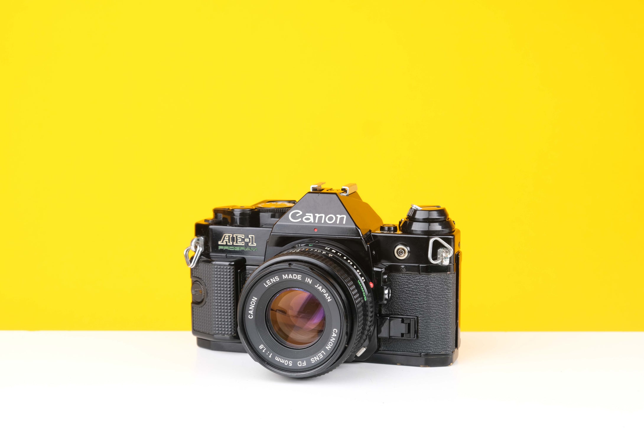 Canon AE-1 Program 35mm SLR Film Camera with Canon FD 50mm f1.8 Lens