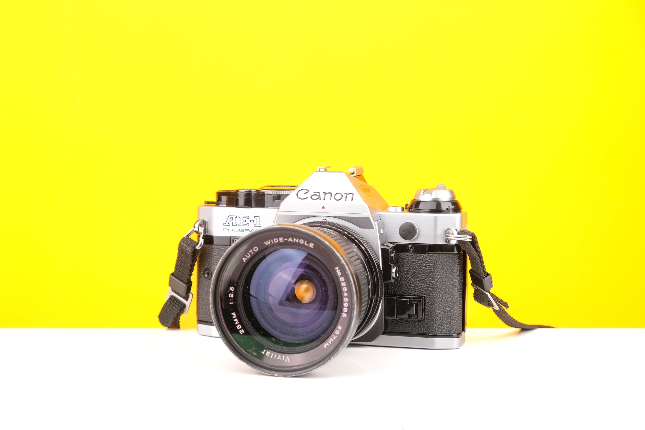 Canon AE-1 Program 35mm SLR Film Camera with Vivitar Auto Wide-Angle 28mm f2.5 Lens