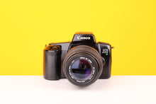 Load image into Gallery viewer, Canon EOS 1000f N 35mm SLR Film Camera with Sigma UC Zoom 70-210mm f4-5.6 Lens
