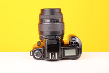 Load image into Gallery viewer, Canon EOS 1000f N 35mm SLR Film Camera with Sigma UC Zoom 70-210mm f4-5.6 Lens
