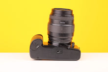 Load image into Gallery viewer, Canon EOS 1000f N 35mm SLR Film Camera with Sigma UC Zoom 70-210mm f4-5.6 Lens
