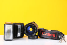 Load image into Gallery viewer, Canon T50 35mm SLR Film Camera Bundle
