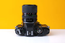 Load image into Gallery viewer, Chinon CE-5 35mm Film with f3.5-4.5 with 35-70mm Zoom Lens
