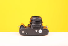 Load image into Gallery viewer, Chinon CG-5 35mm SLR Film Camera with Pentax-M SMC 50mm f2 Lens
