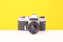 Load image into Gallery viewer, Chinon CX 35mm SLR Film Camera with Super Paragon PMC Auto 24mm f2.8 Lens
