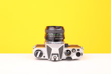 Load image into Gallery viewer, Chinon CX 35mm SLR Film Camera with Super Paragon PMC Auto 24mm f2.8 Lens
