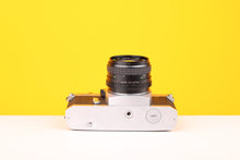 Load image into Gallery viewer, Chinon CX 35mm SLR Film Camera with Super Paragon PMC Auto 24mm f2.8 Lens
