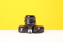 Load image into Gallery viewer, Cosina CSM 35mm SLR FIlm Camera with Vivitar Wide Angle Close Focus MC 28mm f2.8 Lens
