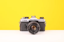 Load image into Gallery viewer, Fujica ST605 35mm SLR Film Camera with Helios-44M-4 58mm f2 Lens
