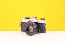 Load image into Gallery viewer, Fujica ST605 35mm SLR Film Camera with Helios-44M-4 58mm f2 Lens
