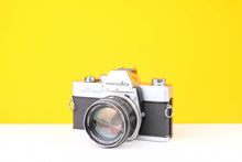 Load image into Gallery viewer, Minolta SrT100X 35mm SLR Film Camera with Minolta Rokkor-PF MC 58mm f1.4 Lens
