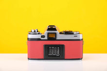 Load image into Gallery viewer, Minotla XD 35mm SLR Film Camera with Auto Tamron 35mm f2.8 Lens in Red
