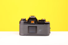 Load image into Gallery viewer, Nikon EM 35mm SLR Film Camera with Sigma Super-Wide Multi-Coated 24mm f2.8 Lens
