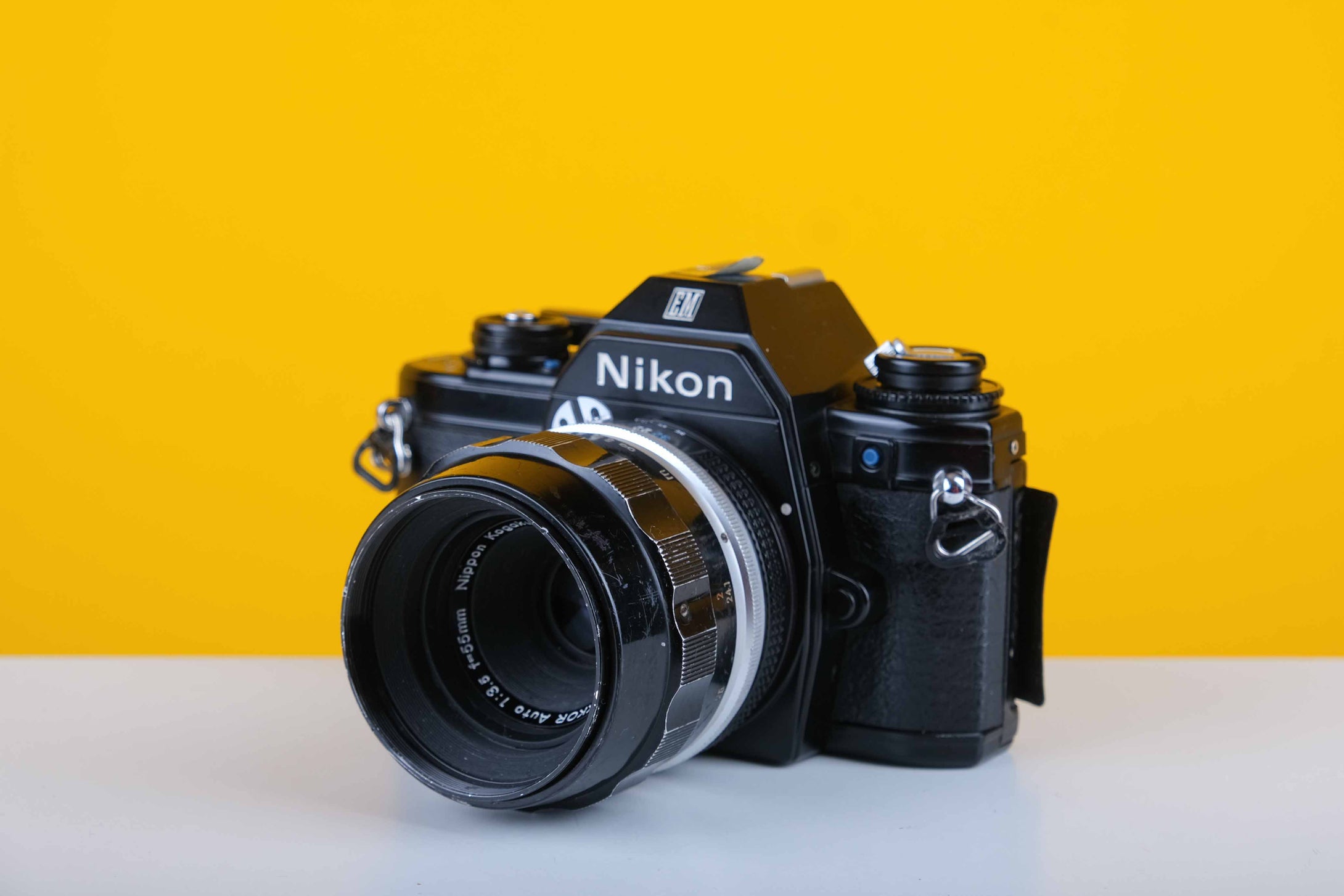 Nikon EM 35mm Film Camera with Micro-Nikkor Auto 55mm f3.5 Lens