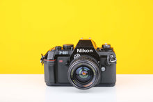 Load image into Gallery viewer, Nikon F-301 35mm SLR Film Camera with Bell&amp;Howell 28mm f2.8 Lens
