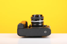 Load image into Gallery viewer, Nikon F3 35mm Film Camera with Nikon Nikkor 50mm f1.4 Lens with Nikon Motor Drive MD-4
