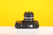 Load image into Gallery viewer, Nikon F3 35mm Film Camera with Nikon Nikkor 50mm f1.4 Lens with Nikon Motor Drive MD-4
