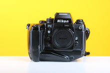 Load image into Gallery viewer, Nikon F4 35mm SLR Film Camera Body with Nikon MB-21 Motor Winder Attachment
