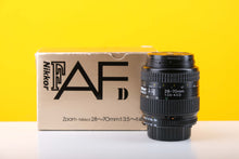 Load image into Gallery viewer, Nikon F4 35mm SLR Film Camera with Nikon F Nikkor 28-70mm f3.5-4.5 D Lens Boxed
