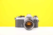 Load image into Gallery viewer, Nikon FE 35mm SLR Film Camera with Nikon Nikkor 50mm f1.4 Lens
