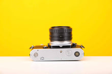 Load image into Gallery viewer, Nikon FM 35mm SLR Film Camera with Nikon Series E 35mm f2.5 Lens
