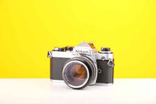 Load image into Gallery viewer, Nikon FE 35mm SLR Film Camera with Nikon Nikkor 50mm f1.4 Lens
