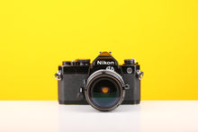 Load image into Gallery viewer, Nikon FM 35mm Film Camera with Nikon Nikkor 28mm f/2.8 Lens
