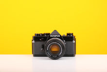 Load image into Gallery viewer, Olympus OM-1 35mm SLR Film Camera with Olympus OM-System F.Zuiko Auto-S 50mm f1.8 Lens
