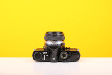 Load image into Gallery viewer, Olympus OM-1 35mm SLR Film Camera with Olympus OM-System F.Zuiko Auto-S 50mm f1.8 Lens
