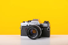 Load image into Gallery viewer, Olympus OM10 35mm Film Camera Bundle
