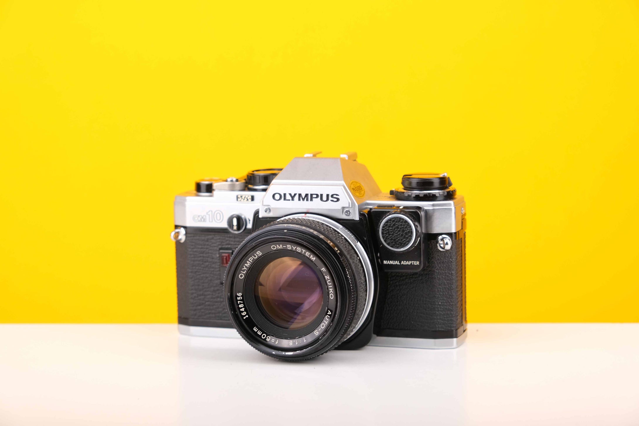 Olympus OM10 SLR 35mm Film Camera with Olympus Auto-S 50mm f1.8 MC Lens and Manual Adapter