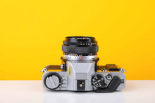 Load image into Gallery viewer, Olympus OM20 35mm SLR Film Camera with Zuiko 50mm f1.8 Lens
