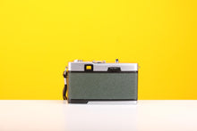 Load image into Gallery viewer, Olympus Trip 35 Vintage Film Camera With Dark Green Leather Skin
