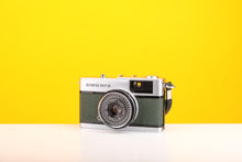 Load image into Gallery viewer, Olympus Trip 35 Vintage Film Camera With Dark Green Leather Skin
