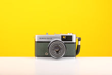 Load image into Gallery viewer, Olympus Trip 35 Vintage Film Camera With Dark Green Leather Skin
