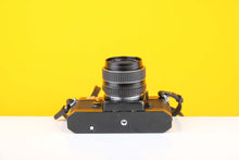 Load image into Gallery viewer, Pentax ES II 35mm SLR Film Camera with Takumar SMC 50mm f1.4 Lens with Case
