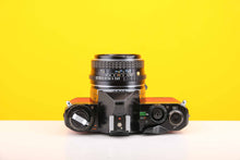 Load image into Gallery viewer, Pentax MV 35mm SLR Film Camera with Pentax- M 50mm f2 Lens in Red
