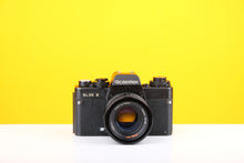 Load image into Gallery viewer, Rolleiflex SL35 E 35mm Film Camera with Rollei Planar 50mm f1.8 Lens
